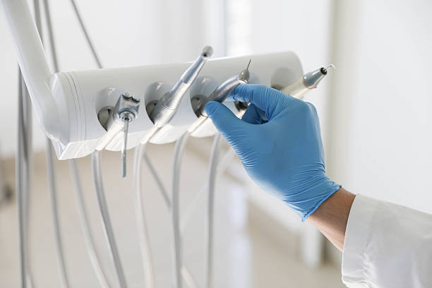 Professional Invisalign Clear Aligners technician working in Denison, IA